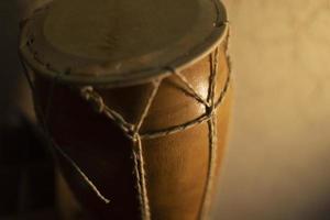 Wooden drum. African percussion instrument. Traditional musical instrument. photo