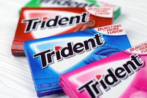 KHARKIV, UKRAINE - MARCH 15, 2022 Packs of Trident gums. Trident was introduced in 1964 as one of the first patented sugarless gums photo