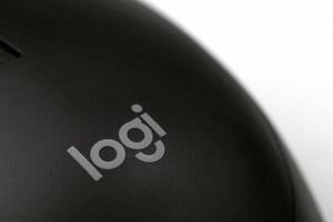 KHARKIV, UKRAINE - MARCH 5, 2022 Logitech wireless mouse on white background. Logitech is a Swiss multinational manufacturer of computer peripherals photo