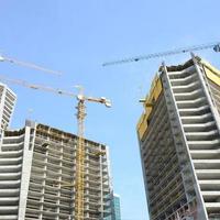 Construction site. High rise multi storey buildings under construction photo