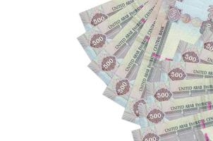 500 UAE dirhams bills lies isolated on white background with copy space. Rich life conceptual background photo