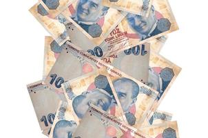 100 Turkish liras bills flying down isolated on white. Many banknotes falling with white copyspace on left and right side photo