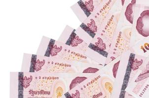 100 Thai Baht bills lies in different order isolated on white. Local banking or money making concept photo