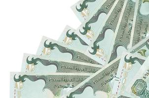 10 UAE dirhams bills lies in different order isolated on white. Local banking or money making concept photo