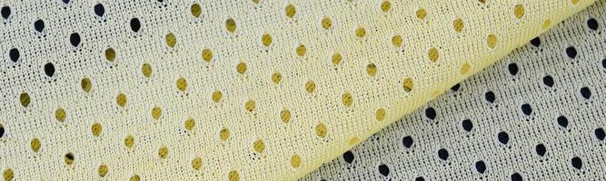 Yellow mesh sport wear fabric textile background pattern photo