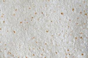 Homemade flat pita bread Turkish lavash background texture top view photo