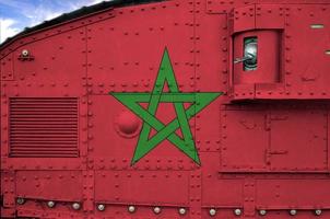 Morocco flag depicted on side part of military armored tank closeup. Army forces conceptual background photo