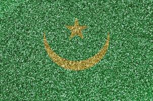 Mauritania flag depicted on many small shiny sequins. Colorful festival background for party photo