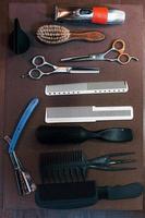 Close up view of vintage barber shop tools that lying down on the table photo