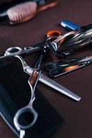 Close up view of vintage barber shop tools that lying down on the table photo