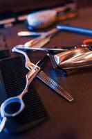 Close up view of vintage barber shop tools that lying down on the table photo