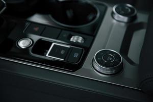 Different options. Close up view of interior of brand new modern luxury automobile photo