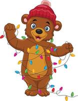 Cartoon bear wearing hat with christmas lights vector