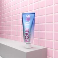 3D rendering facial foam tube mockup on pink tile background photo