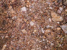 The Red dirt and rocks  flat lay image for background or texture concept photo