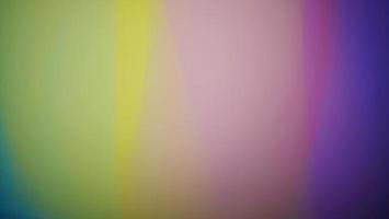 Smooth and blurry colorful gradient mesh background. Purple, yellow, green and black. photo