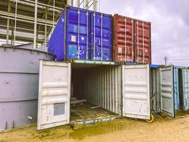 warehouse for building materials. multicolored containers for materials, construction of a mine for mining. plastic mini warehouses photo