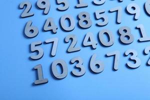 Colorful wooden numbers background. Numbers texture abstraction. Global economy crisis concept. Finance data pattern. photo