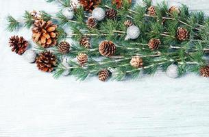 New Year or New Year's Eve background with fir branch with cones. The year 2023 is coming. photo