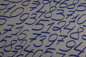 Colorful wooden numbers background. Numbers texture abstraction. Global economy crisis concept. Finance data pattern. photo
