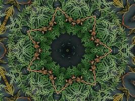 fondo de caleidoscopio abstracto negro con adorno de hojas para el patrón de vibraciones navideñas foto