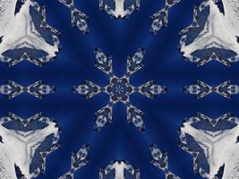 Dark blue sky floral abstract background kaleidoscope unique and aesthetic pattern photo