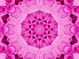 Magenta floral kaleidoscope pattern. Pink flower abstract unique and aesthetic background photo