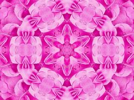 Magenta floral kaleidoscope pattern. Pink flower abstract unique and aesthetic background photo