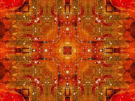 Colorful red fire kaleidoscope background abstract flower and symmetric pattern photo