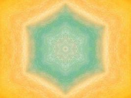 Colorful yellow and blue light kaleidoscope background abstract flower and symmetric pattern photo