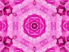 Magenta floral kaleidoscope pattern. Pink flower abstract unique and aesthetic background photo