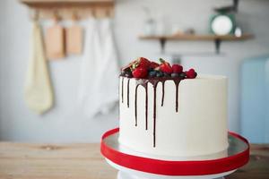 Homemade pie with cherry and chocolate on it indoors at kitchen photo