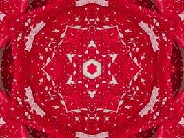 Red floral kaleidoscope background abstract unique and symmetric pattern for christmas vibes photo
