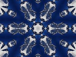 Dark blue sky floral abstract background kaleidoscope unique and aesthetic pattern photo