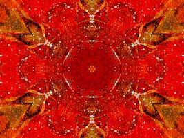 Colorful red fire kaleidoscope background abstract flower and symmetric pattern photo