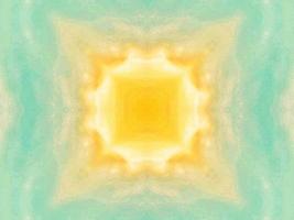 Colorful yellow and blue light kaleidoscope background abstract flower and symmetric pattern photo