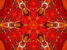 Colorful red fire kaleidoscope background abstract flower and symmetric pattern photo