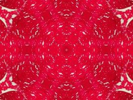 Red floral kaleidoscope background abstract unique and symmetric pattern for christmas vibes photo