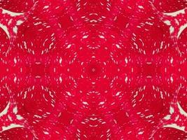 Red floral kaleidoscope background abstract unique and symmetric pattern for christmas vibes photo