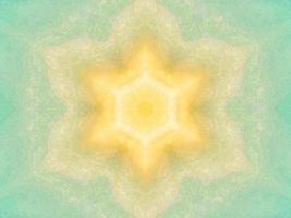 Colorful yellow and blue light kaleidoscope background abstract flower and symmetric pattern photo