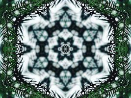 Blurry green leaves kaleidoscope background abstract flower and symmetric pattern for christmas vibes photo