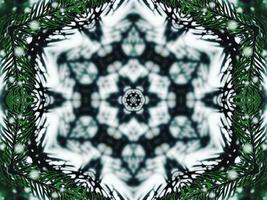 Blurry green leaves kaleidoscope background abstract flower and symmetric pattern for christmas vibes photo