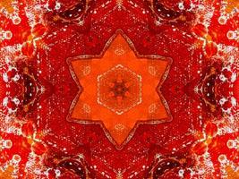 Fondo de caleidoscopio de fuego rojo colorido flor abstracta y patrón simétrico foto