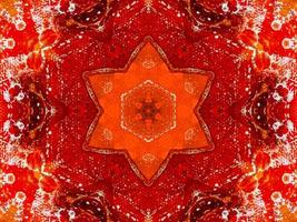 Colorful red fire kaleidoscope background abstract flower and symmetric pattern photo