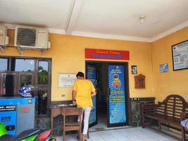 Central Java, Indonesia in October 2022. Several people are queuing and waiting at the BPKB service office or vehicle certificate of ownership at the Jepara Police photo