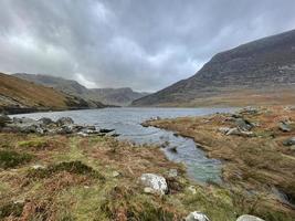 A beautiful lake in the middle of the mountains of North Wales photo