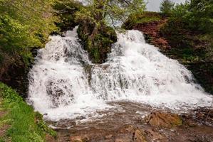 Waterfall on the river Dzhurin in Zaleschitsky district of Ternopil region of Ukraine. Dzhurinsky waterfall photo