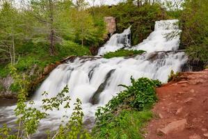 Waterfall on the river Dzhurin in Zaleschitsky district of Ternopil region of Ukraine. Dzhurinsky waterfall photo