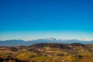 Langhe landscapes with Monviso in the background in the autumn season photo