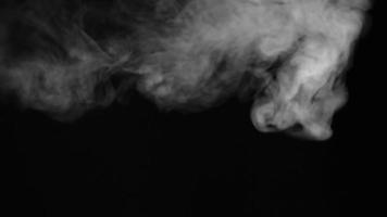 Shot of white smoke on a black background video